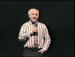 Ken Kesey speaks at conference on the sixties Stock Footage