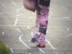 MS  One girl drawing hopscotch with chalk on sidewalk and two girls skip and play hopscotch  / Langley, British Columbia, Canada. Stock Footage