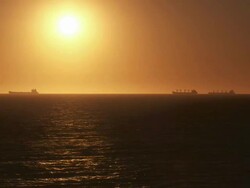HD: Tanker Silhouettes At Sunset Stock Footage