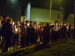 Candlelight crowd taking tour Stock Footage