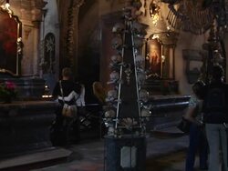 Pan right Bone church interior Kutna hora Czech Republic Stock Footage