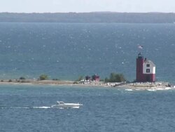 Lonely lighthouse and the boat - HD 1080/60i Stock Footage