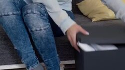 Graphic designer working at home, looking at blueprints Stock Footage