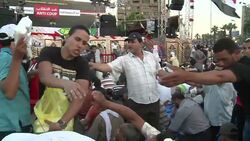 CLEAN : Pro Morsi protesters break their Ramadan News Clip