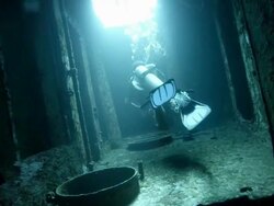 WS Diver exploring a shipwreck Stock Footage