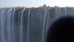 Water tumbling over Victoria Falls News Clip