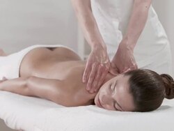 HD DOLLY: Therapist Giving Deep Massage On Shoulders Stock Footage