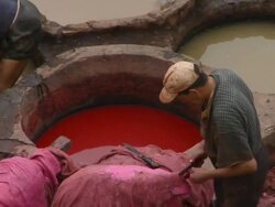 MS, HA, Two men working at tannery, Fez, Morocco Stock Footage