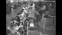 Factory workers in US making hand grenades during Korean War News Clip