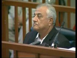 WRAP Survivor of poison gas attack testifies in genocide trial of Saddam, plus new bites News Clip