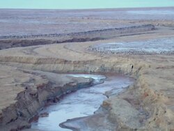 AERIAL WS TS View of muddy surface of dead sea in desert / Sourn Judea Desert, Israel  Stock Footage