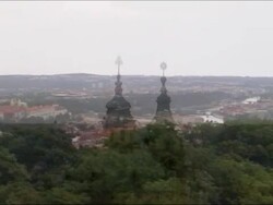 Woman observing Prague with telescope Stock Footage