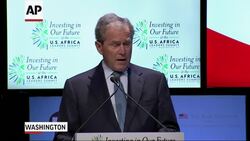 Former U.S. president George W. Bush gave remarks at the U.S. Africa Leaders Summit Wednesday about his organization Pink Ribbon Blue Ribbon's work in Africa to treat people with AIDS. He announced the addition of two partners, Ethiopia and Namibia. (Aug News Clip