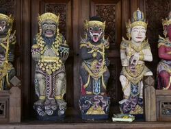 MS Old wood carving god like figure at temple guardian / Ubud, Bali, Indonesia Stock Footage