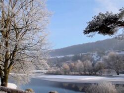 FROST AT FROZEN SMALL LAKE Stock Footage