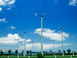 Solar Panels and White wind turbine Stock Footage