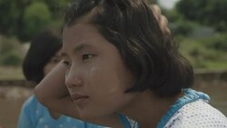 M/S Burmese teenage girls in a motorboat, change of focus Stock Footage