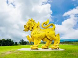 Large gold lion statue Stock Footage