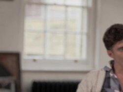 CU PAN  young men and women chatting and laughing hand held Stock Footage