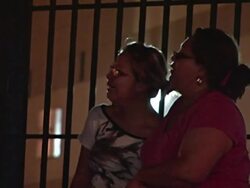 MS Shot of dead gun shot victim relatives crying at crime scene AUDIO / Ciudad Juarez, Juarez, Mexico Stock Footage