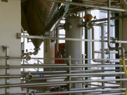 MS Steam expelling from tank in brewery / Wau, Western Bahr el Ghazal, Sudan  Stock Footage