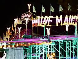 MS Shot of People enjoying ride on rollercoaster at funfair / Cologne, Germany Stock Footage