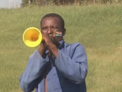 African Soccer Fan blowing Horn Vuvuzela - HD & PAL Stock Footage