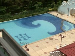 MS Guest swimming at pool in luxury hotel / Sihanoukville, Cambodia Stock Footage