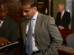 Business Professionals Discuss Documents Stock Footage