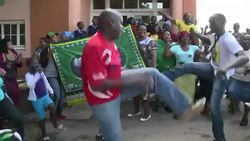 CLEAN : Singing and dancing as Mandelas body flown News Clip