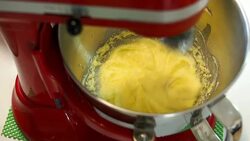 Mixing cream in mixing machine Stock Footage