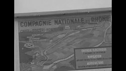 Sign at site of dam construction on Rhone River in France with map of entire dam system News Clip