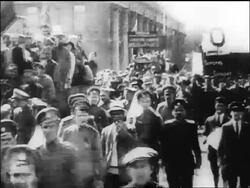 B/W 1917 soldiers + people carrying signs marching towards camera / Russia / documentary Stock Footage
