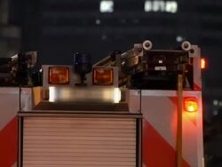 Fire Truck at night, raining, city background (HD720p) Stock Footage