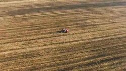 Tractor sowing on a farm Stock Footage