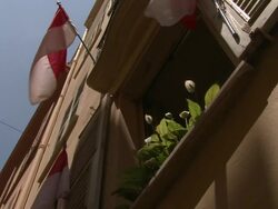 ATMOSPHERE Flag and flowers at the Monaco General Views at Monaco . (Footage by WireImage Video/Getty Images Entertainment Video) Stock Footage