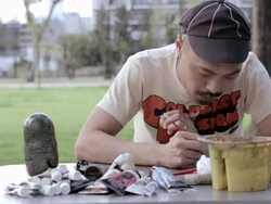 MS Artist making Matryoshka doll at the park / Nerima, Tokyo, Japan Stock Footage