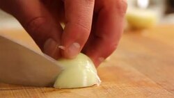 Slicing onion Stock Footage