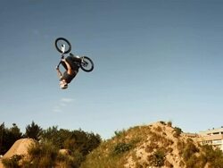 HD SLOW MOTION: Bmx Rider Doing Backflipping Dirt Jump Stock Footage