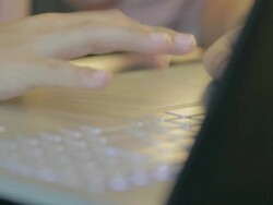 woman Typing at Keyboard,Dolly shot Stock Footage