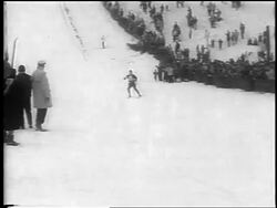 B/W 1962 skier stopping towards camera in competition / Chamonix, France / newsreel Stock Footage