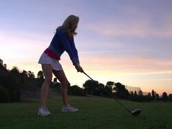 A woman playing golf. - Slow Motion Stock Footage
