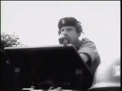 B/W 1961 British soldier in headphones talking into microphone outdoors / West Germany / Cold War Stock Footage