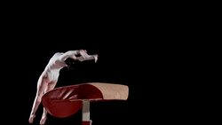 SLO MO Female gymnast performing routine on vault Stock Footage