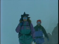 MS People climbing in fog, to camera, Rwenzori Mountains, Uganda Stock Footage