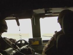 MS POV Two people travelling in vehicle / Musa Qala, Helmand Province, Afghanistan. Stock Footage