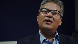 CLEAN : God and good luck guide commuters on rebel hit Thai train News Clip