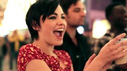 Friends clap and cheer for band at outdoor concert in downtown Las Vegas Stock Footage