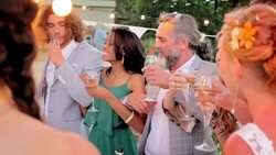 Bride and groom dancing and drinking champagne at reception Stock Footage