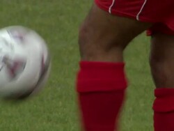 CU Soccer player's legs as he practices by kicking ball around/ Sheffield, England Stock Footage